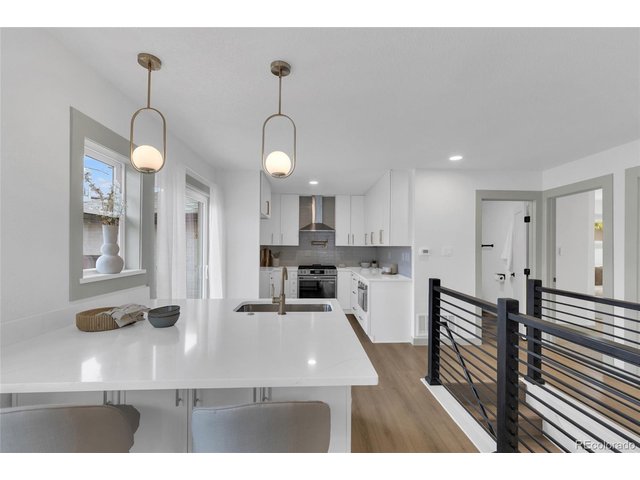 Property Photo 1 LARGE ISLAND WITH QUARTZ COUNTERTOP AND STORAGE!
