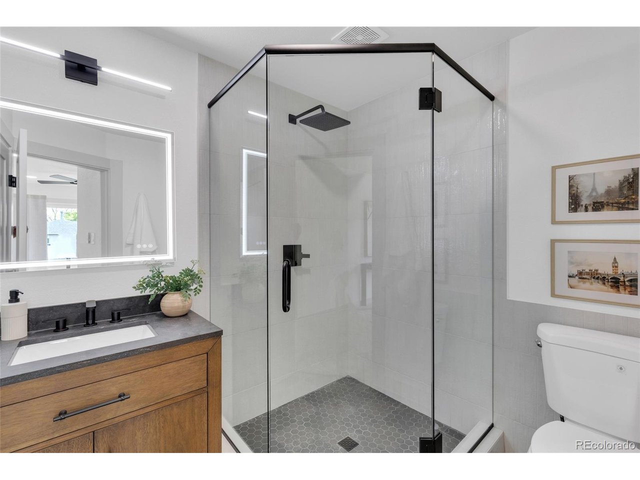 CUSTOM TILED BATHROOM AND LIGHTED MIRROR!