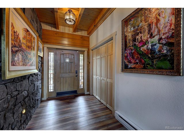 Property Photo 4 Generous entrance welcomes you to soaring ceilings and windows