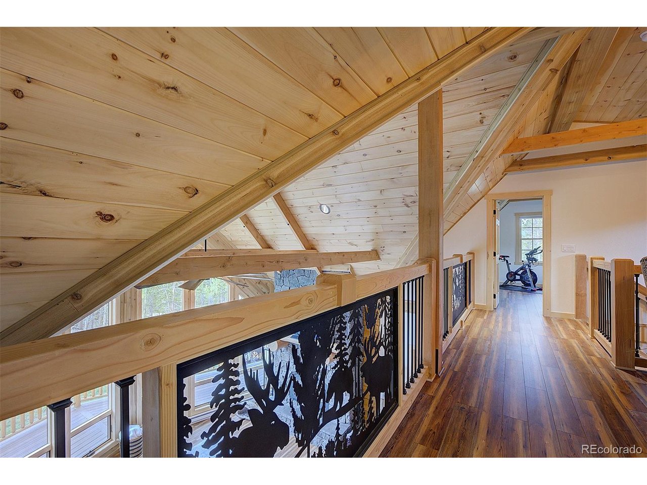 Upper level is a generous space for home offices and guests offering 2 conforming bedroms