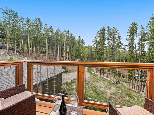 Property Photo 21 Relax and take in forest views from the private balcony