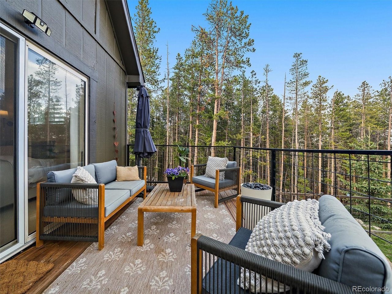 Private main-level deck overlooking the pines